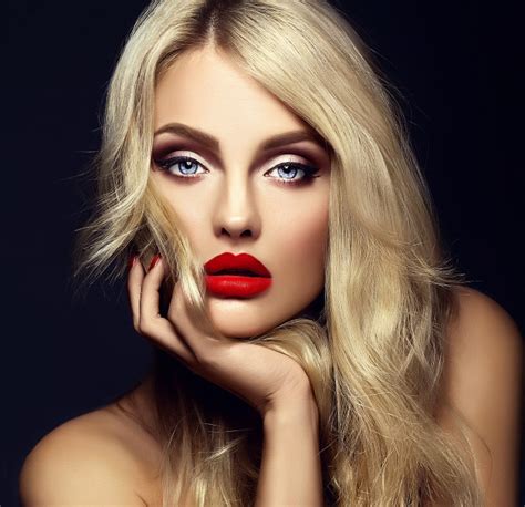 free sensual glamour portrait of beautiful blond woman model lady with bright makeup and red