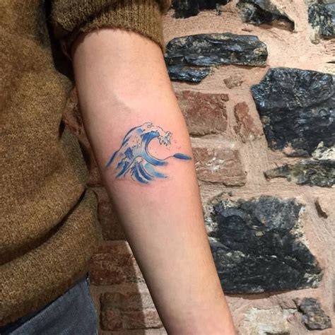 Blue Ink Wave Tattoo By Dovenadam Blue Ink Tattoos Boho Tattoos Body