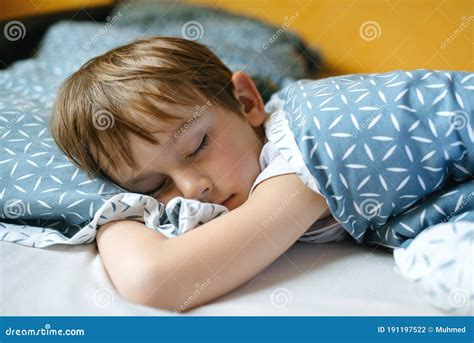 Little Boy Sleeping In His Bed Tired Sweet Child In Bedroom Stock