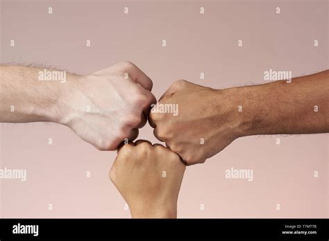 Hand Fist Bumping Isolated 3 People Bumping Their Fist Teamwork And Success Concept Stock