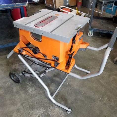 Ridgid Table Saw On Folding Rolling Stand Big Valley Auction