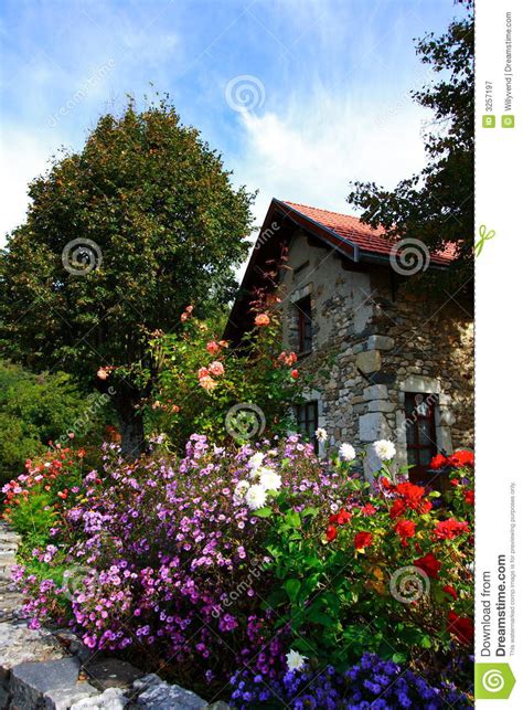 Old House And Flowers Royalty Free Stock Photography