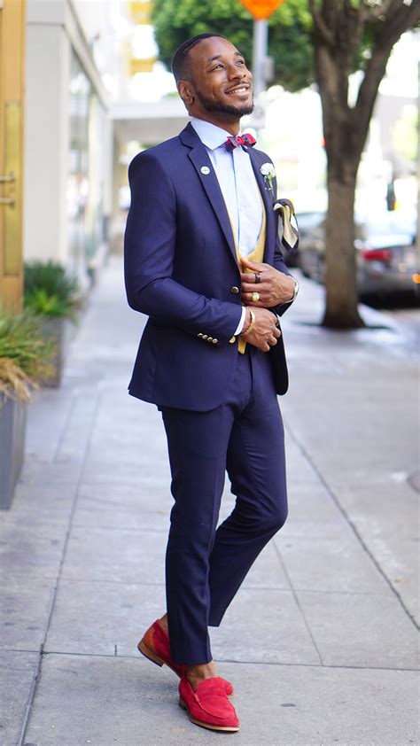Today, the color palette is a handsome and stylish choice for a suit — but you need to know what to pair with your navy suit. HOW TO STYLE RED LOAFERS FOR THE SUMMER - Norris Danta Ford