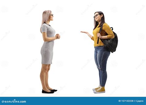Two Young Females Having A Conversation Stock Photo Image Of Gesture