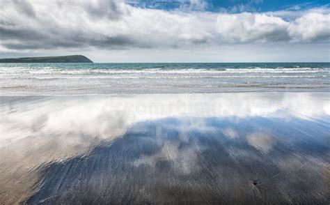 Cloudy Sky Reflected In Wet Sandy Beach Stock Image Image Of Summer