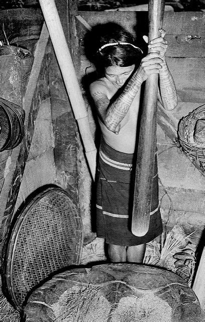 tattooed igorot woman with mortar and pestle on northern luzon island philippines 1955 1956