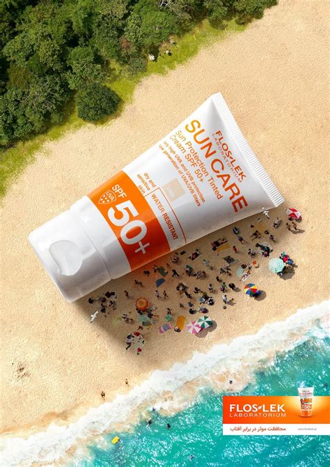 Sunscreen On The Beach With People Standing In The Sand And Water