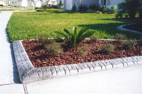Concrete sidewalk and asphalt pathways are the latest favorite way to beautify a property. Kwik Kerb Landscape Driveway Borders and pathway edging ...