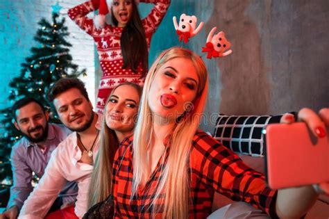 Friends Making Selfie While Celebrating Christmas Or New Year Eve At
