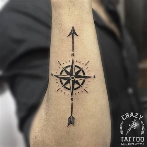 Compass With Arrow Tattoo Compass Tattoo Forearm Cool Tattoos For Guys Weird Tattoos