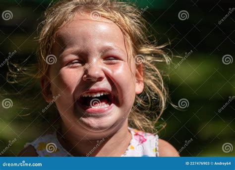 The Child Is Crying And Laughing The Child Is Hysterical Stock Image