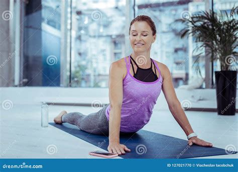 Calm Mature Woman Doing Effective Yoga Poses Stock Photo Image Of