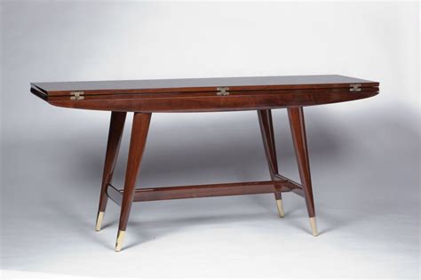Crafted on a monumental scale over 7.5 feet long and 2 inches thick with scrolled ends. Gio Ponti Convertible Console/Dining Table | Table, Modern console tables, Simple dining table