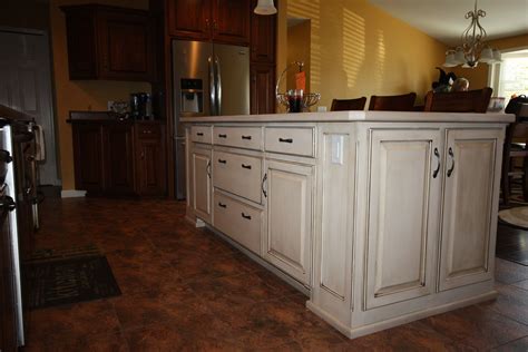 If you already have bold kitchen cabinetry, look to a contrasting wood finish to make your island stand out. Maple Island with White Varnish and Glaze Finish | Kitchen, Kitchen cabinets, Home decor