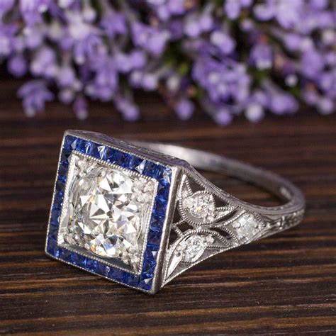 This style ring can be set with center stones ring is available to be made in platinum & 18k gold. Antique Art Deco Diamond and Sapphire Square Engagement Ring