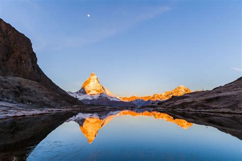 Early Morning Sun On The Matterhorn Mountain Reflected In Riffelsee