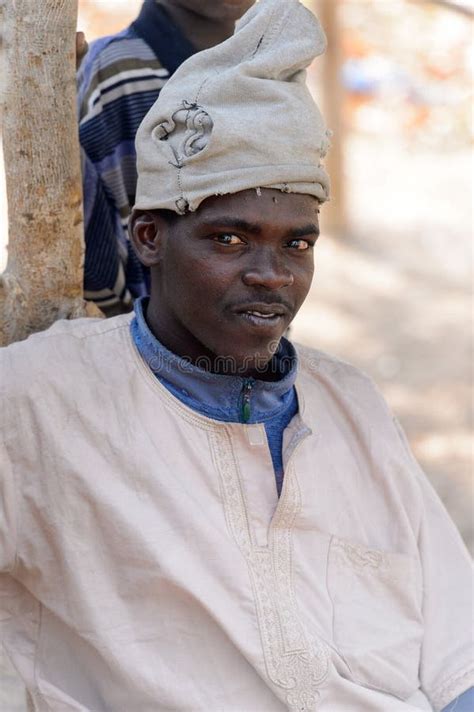 Unidentified Fulani Man In National Clothes Looks Ahead In The