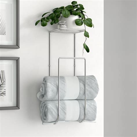 An outdoor towel rack that attaches to a wall is excellent if you have a dedicated drying area. Dotted Line™ Demi Wall Mounted Towel Rack & Reviews