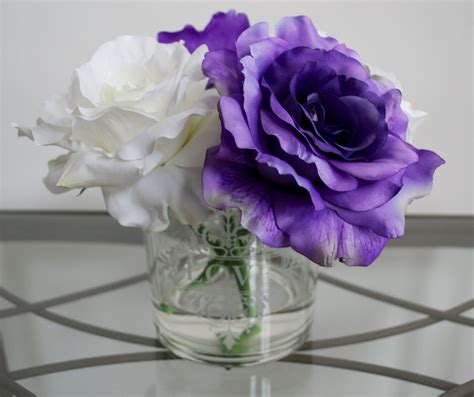 Purple And White Rose Flower Arrangement In Love Glass Vase