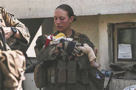 13 Americans Killed In Afghanistan Identified Marine Who Cradled Baby