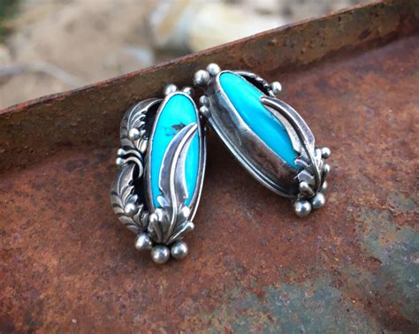 Traditional Navajo Turquoise Earrings With Sterling Silver Feather
