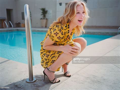 Christina Applegate Squatting And Laughing By Pool Christina