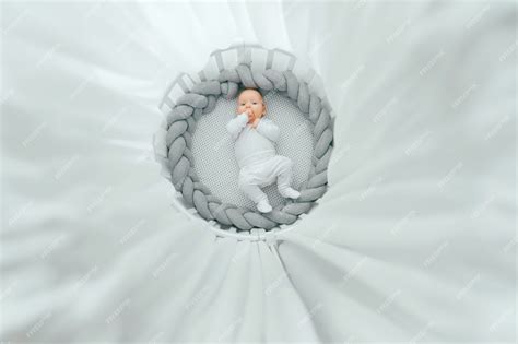 Premium Photo Portrait From Above Of Beautiful Funny Newborn Baby Boy