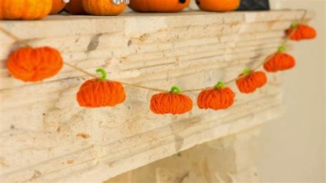 Make A Yarn Pumpkin Garland Dollar Store Crafts
