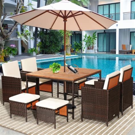 Costway 9PCS Patio Rattan Dining Set Cushioned Chairs Ottoman Wood