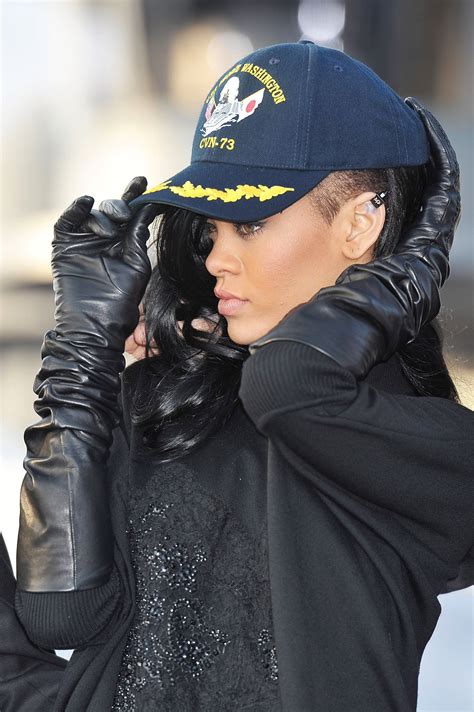 rihanna shows off her new dark hair at a battleship event black leather gloves leather gloves