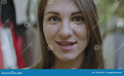 Close Up Portrait Of Smiling Attractive Blond Woman Licking Her Upper