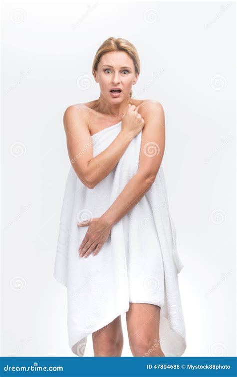 Beautiful Adult Woman With Fresh Healthy Skin Covering Herself Stock