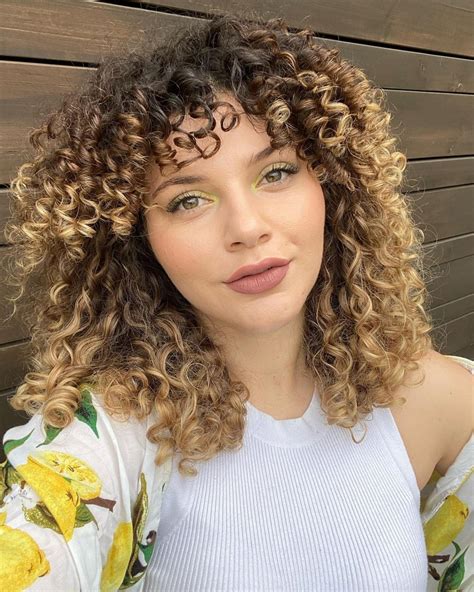 28 most popular ways to get curly hair with bangs right now