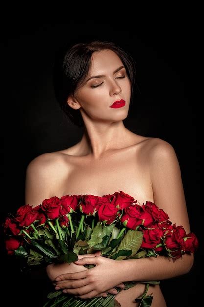 Premium Photo Sexy Beautiful Woman Holding Large Bouquet Of Red Roses