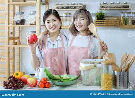 Lgbt Concept A Loving Couple Is Cooking In The Kitchen Stock Image Image Of Beautiful Lunch