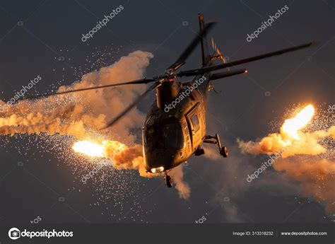 Military A109 Helicopter Firing Flares Stock Photo By ©foto Vdw 313318232