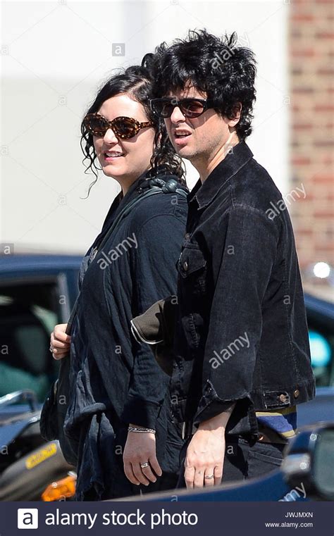 Billie Joe Armstrong And Adrienne Armstrong After Playing The Stock