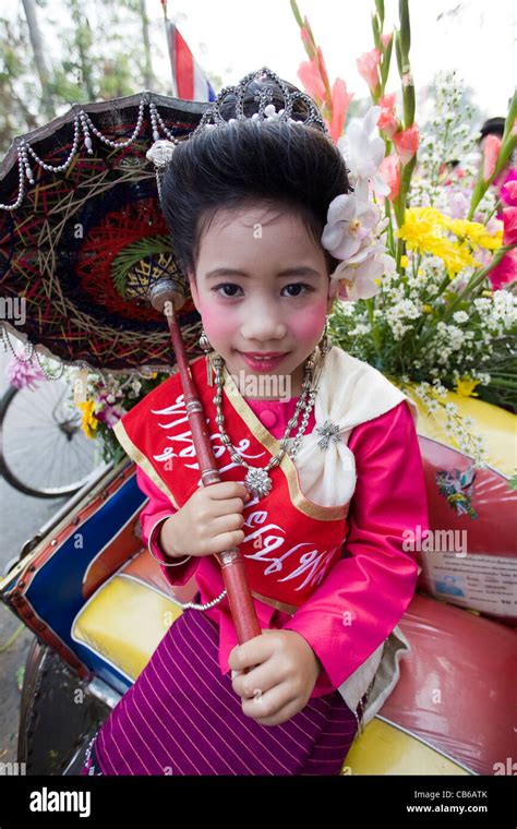 Thailand Chiang Mai Portrait Of Girl In Traditional Thai Costume At The Chiang Mai Flower
