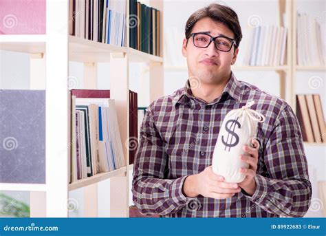 The Young Student In Expensive Textbooks Concept Stock Image Image Of