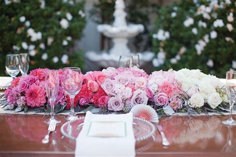 Check out this wedding flower checklist for all the other times you might want to use fresh blooms at your event. Ombre Wedding Table Flower Arrangement | OneWed.com