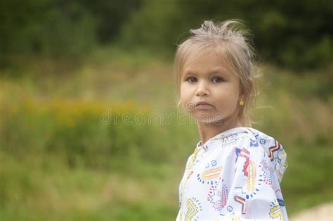 Little Preschooler Girl Playing In Flower Garden Stock Photo Image Of