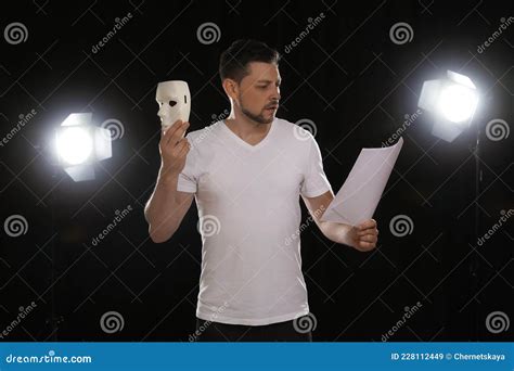 Professional Actor Reading His Script During Rehearsal In Theatre Stock