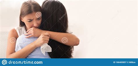Girl Embracing And Comforting Crying Desperate Friend White Background
