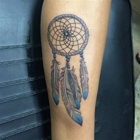 Girls love dreamcatcher tattoo with colorful design ink on the side thigh. 80+ Best Dreamcatcher Tattoo Designs & Meanings - Dive ...