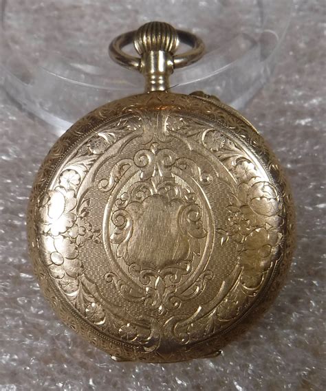 14k gold pocket watch antiques board