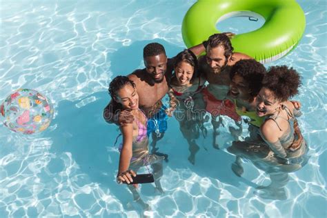 Diverse Group Of Friends Having Fun And Taking Selfie In Swimming Pool Stock Image Image Of