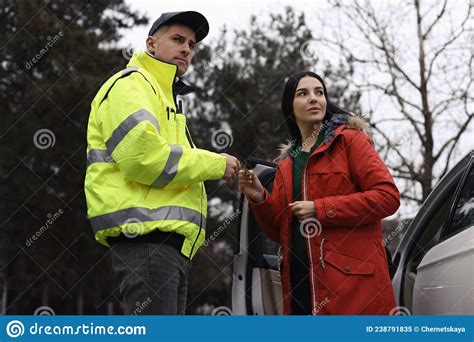 Woman Giving Bribe To Police Officer Near Car Outdoors Stock Image Image Of Male Automobile