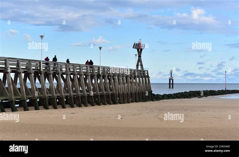 Tourists Visiting The Jetty At Courseulles Sur Mer Calvados Normandy