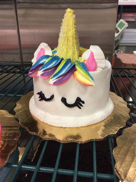 A seated or standing unicorn in a relatively simple frosted background looks pretty amazing. Unicorn cake. 5 inch round cake. Rainbow hair. Ice cream ...