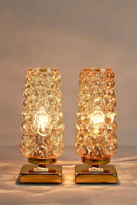 A vintage stacked bubble form table lamp in emerald green glass. Vintage 1960s Limburg Style Amber Bubble Glass and Brass ...